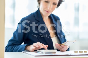 stock-photo-65047529-young-female-bank-officer-at-work (1)