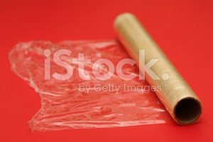 stock-photo-10482011-cling-film-on-red-background