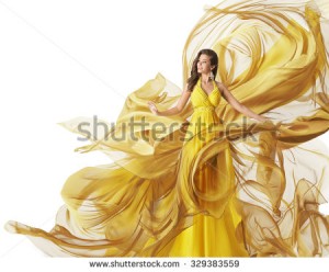 stock-photo-fashion-model-dress-woman-in-flowing-fabric-gown-clothes-flow-on-wind-white-yellow-329383559