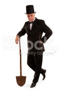 stock-photo-18871590-gravedigger-is-standing-with-dirty-spade