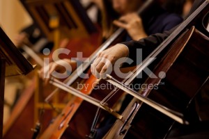 stock-photo-49982332-hands-of-the-man-playing-the-cello