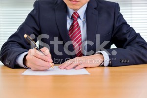 stock-photo-57503662-businessman-writing
