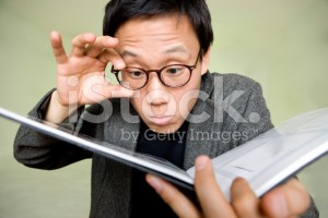 stock-photo-9128453-asian-man-reading